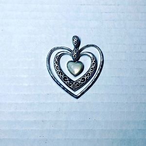Silver vintage antique heart pendant.